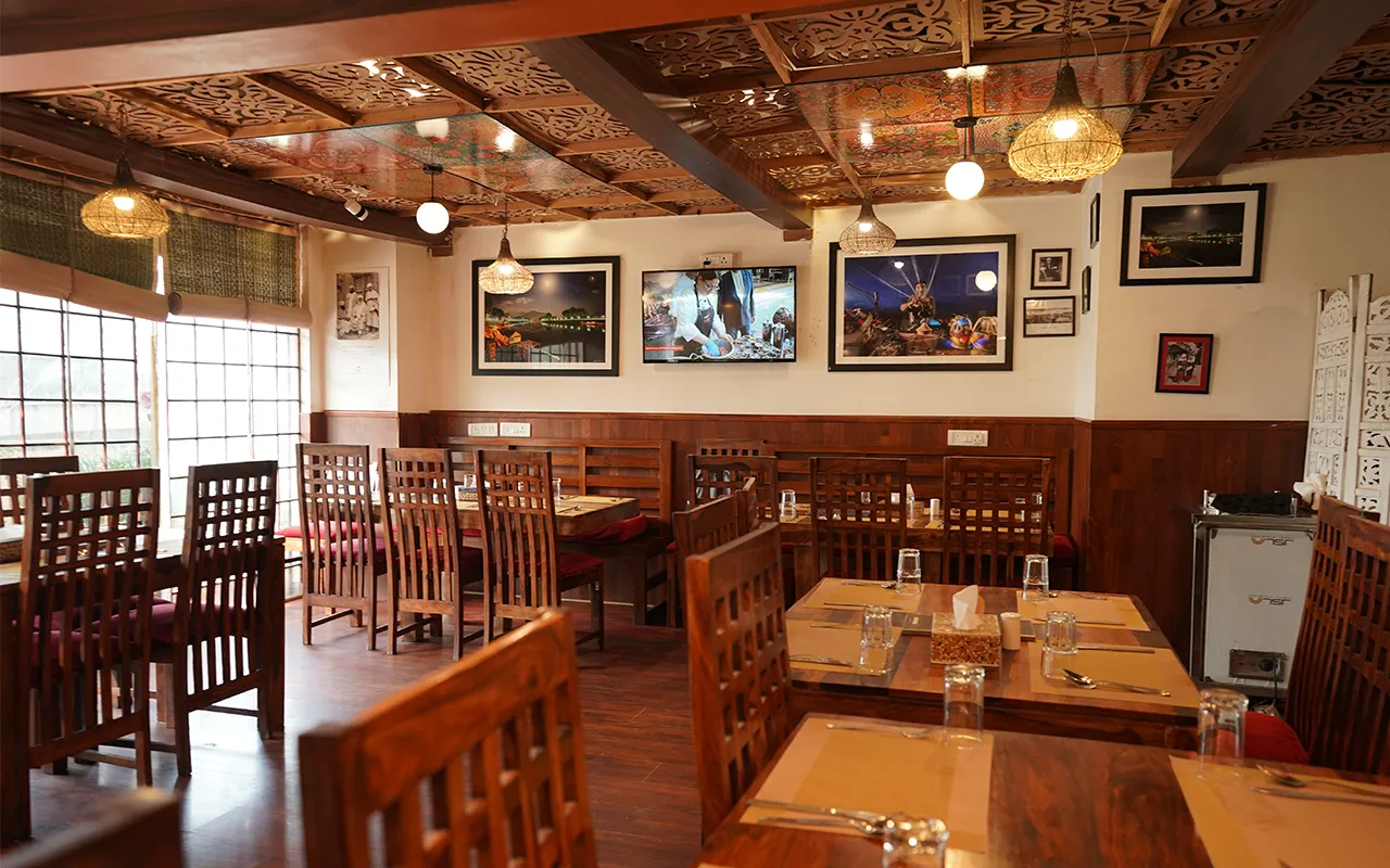 Warm restaurant dining room representing Matamaal hospitality